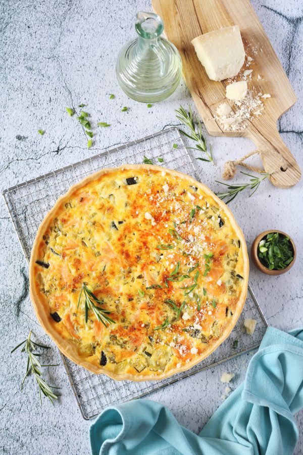 Zucchini and salmon quiche with Parmesan cheese